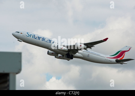 A SriLankan commericial airliner taking off at Terminal 5 of Heathrow airport. UK. Stock Photo