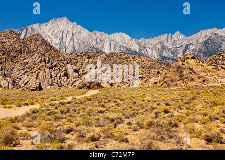 The Alabama Hills, backed by Lone Pine Peak (left) and Mount Whitney (right) in the Sierra Nevada, California, USA. JMH5328 Stock Photo