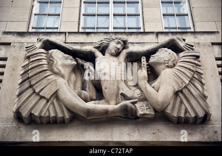 Eric Gill relief sculpture on the outside of BBC Broadcasting House in Portland Place, London, UK Stock Photo