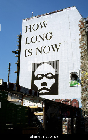 'How long is now'. Facade of the Tacheles building at Oranienburger Strasse in Mitte district of Berlin. Stock Photo