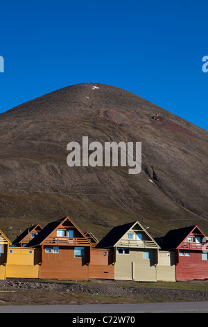 Colourful spisshus timber houses in Longyearbyen, Svalbard, with colours chosen by Grete Smedal. Stock Photo