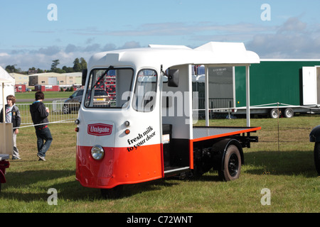 England UK Electric milk float on the cobbled street of a historic city ...