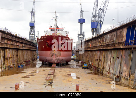 A ship in dry floating dock, Rotterdam, Netherlands Stock Photo