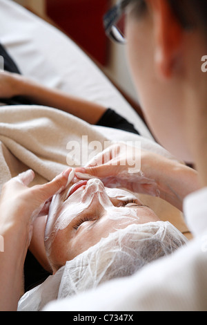 25 year old german bride is getting her make-up for wedding ceremony, germany Stock Photo
