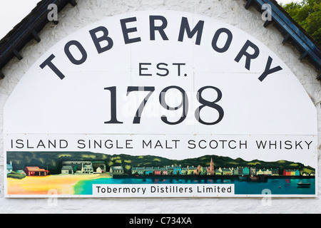 Sign outside the Tobermory Scotch Whisky distillery in the port of Tobermory on the Isle of Mull, Inner Hebrides, Scotland, UK Stock Photo