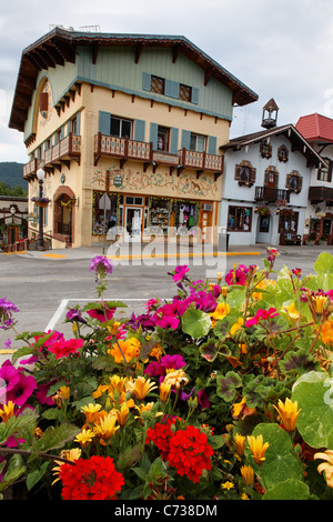 Flowers decorate street in Bavarian themed town of Leavenworth, Chelan County, Washington, USA Stock Photo