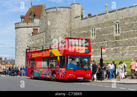 Sightseeing bus on the High Street outside the walls of Windsor Castle, Windsor, Berkshire, England, UK
