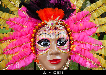 A large colorful mask at the West Indian-American Day Parade in Crown Heights, Brooklyn, New York City. Stock Photo