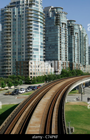 Empty Skytrain trestle tracks which occupy an unmanned commuter train is a part of the rapid transit system in Metro Vancouver . Stock Photo