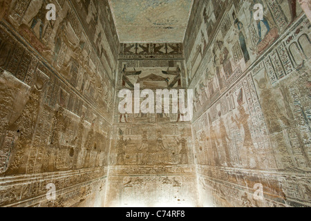 Hieroglyphic carvings and paintings on the interior walls of an ancient egyptian temple Stock Photo