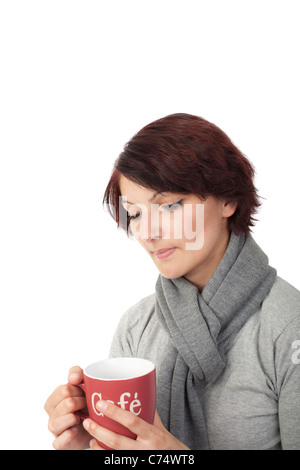 thoughtful young woman holding a coffee cup Stock Photo