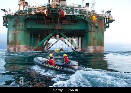 direct action against the exploratory drill rig LEIV EIRIKSSON  by Greenpeace off the coast of Greenland - occupation of Drill P Stock Photo