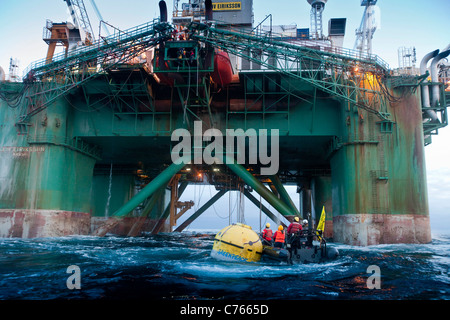 direct action against the exploratory drill rigLEIV EIRIKSSON  by Greenpeace off the coast of Greenland - occupation of Drill P Stock Photo