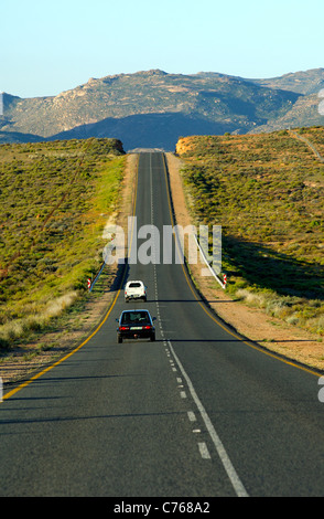 Cars on the national road N7 near Springbok heading in Northern direction towards the border with Namibia, South Africa Stock Photo