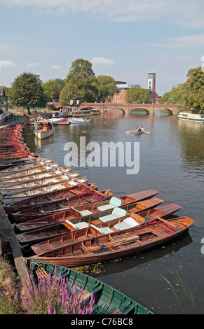 View along the River Avon over punts towards the Royal Shakespeare Company theatre, Stratford Upon Avon, Warwickshire, UK. Stock Photo
