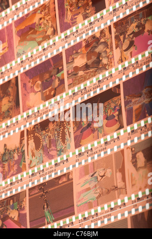 Strips of 35mm colour negative film on a light box Stock Photo