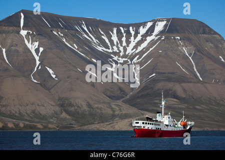 Adventure cruise ship Antarctic Dream in Adventfjorden, near Longyearbyen, Svalbard Stock Photo