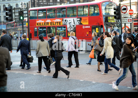 Commuters on way home from work  outside Victoria railway station London 2011 Stock Photo