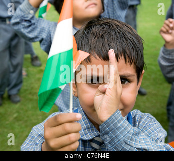 Portrait of a school girl holding the Indian flag Stock Photo