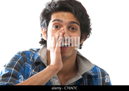 Portrait of a young man cheering Stock Photo