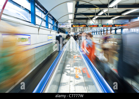 Asia, Japan, Tokyo, Shibuya District, commuters moving through Shibuya Station during rush hour Stock Photo
