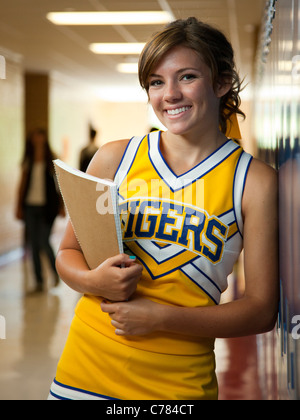 USA, Utah, Spanish Fork, Portrait of school girl (16-17) holding notepad in corridor Stock Photo