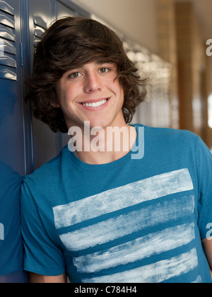 USA, Utah, Spanish Fork, Portrait of school boy standing by lockers Stock Photo