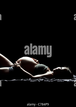 USA, Utah, Orem, Studio shot of pregnant woman Stock Photo