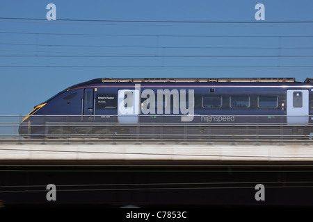 High speed locomotive passing by Rainham Marshes in Essex. Stock Photo