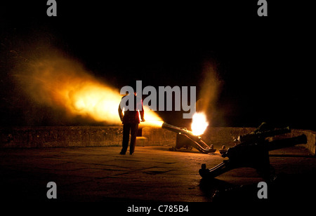 Cannon Firing at Belvoir Castle at night with massive flame blast coming from the muzzle