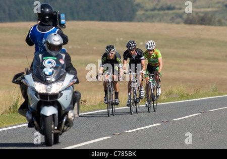 Stage 4 of the Tour of Britain bike race making it's way through the Brecon Beacons on a remote road near Penderyn. Stock Photo