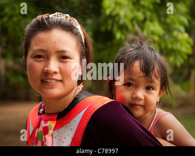 Lisu woman Ami Saenliew and daughter Agimi; Lisu Lodge in rural Chiang Mai, Thailand. Stock Photo