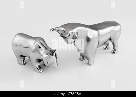 Bull and bear isolated on white, symbolic beasts of market trend. Stock Photo