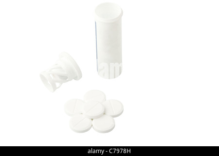 tablets and a bottle with a cover isolated on a white background Stock Photo