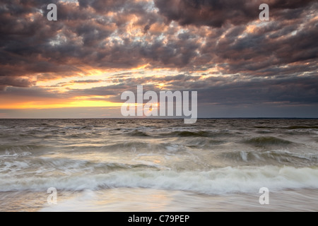 Panoramic view of cloudy sunset on Atlantic ocean Stock Photo