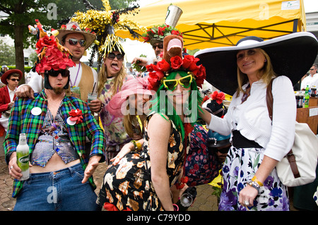 Group of Young Women and Men Partying in the Paddock Aera of Churchill Downs at the 2011 Kentucky Derby in Louisville, Kentucky Stock Photo