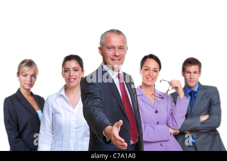 Photo of a business team, focus on the manager with his hand out in a welcoming gesture, isolated on a white background. Stock Photo