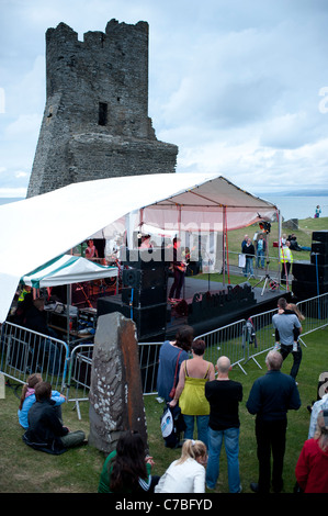 A band playing on stage, Roc y Castell / Castle Rock free music festival Aberystwyth Wales UK Stock Photo