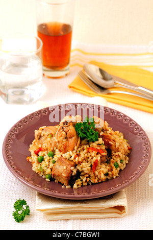 Rabbit with rice. Recipe available. Rabbit with rice. Recipe available.