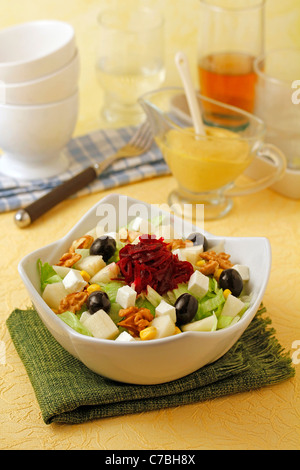 Salad with pears and walnuts. Recipe available. Stock Photo