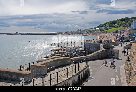 Lyme Regis Dorset View west along front towards The Cobb from Cobb Gate Stock Photo