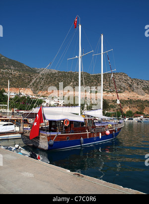 A gulet for hire in the harbour at Kalkan, Antalya, Turkey Stock Photo