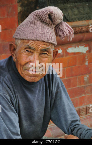 Man sitting at Swayambhunath temple. Stock Photo