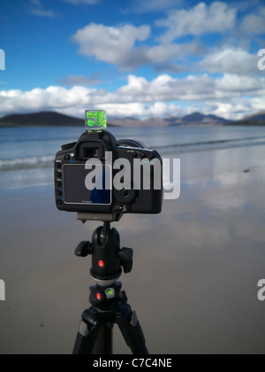 Camera on tripod on the beach Stock Photo - Alamy