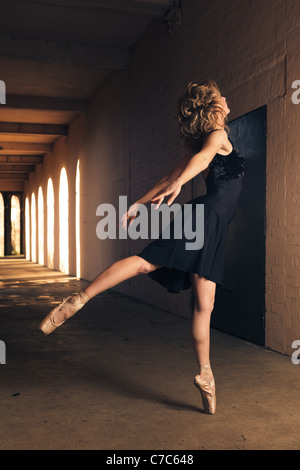 Dancer in arabesque position Stock Photo