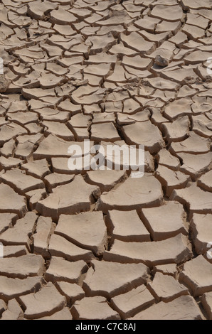 Dried, cracked mud in the desert at Yadan National Park, near Dunhuang, Gansu China Stock Photo