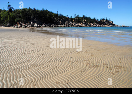 beach at low tide with sand ripples, Florence Bay, Magnetic Island, Queensland, Australia Stock Photo