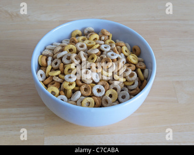 A Bowl or Dish of Cheerios Breakfast Cereals Stock Photo