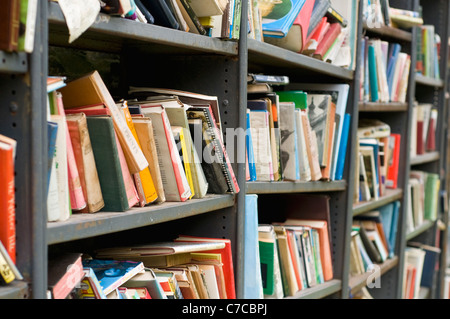 Shelves full of second hand books on sale at a shop in Hay-on-Wye, Powys, Wales Stock Photo
