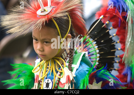 London, Canada - September 17, 2011: A First Nations Canadian wearing traditional clothing participates in a Pow Wow dance durin Stock Photo